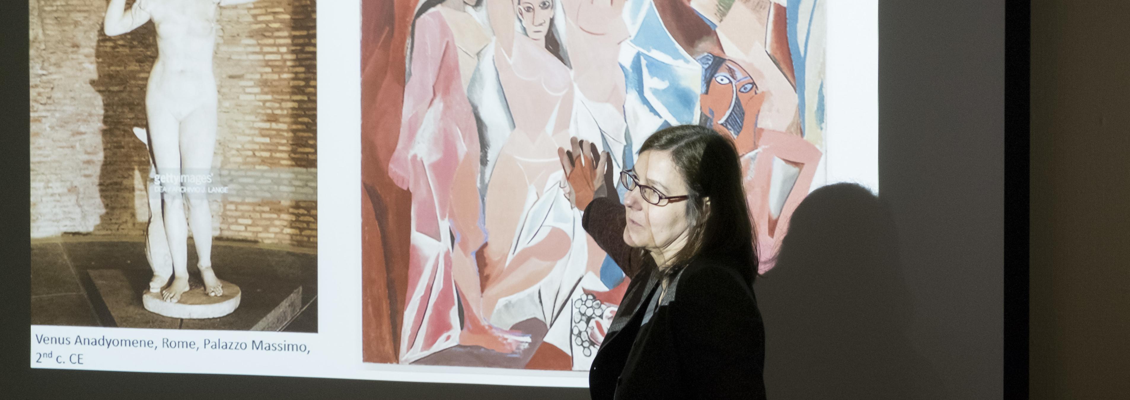 Professor Kriszta Kotsis teaches an art history class.