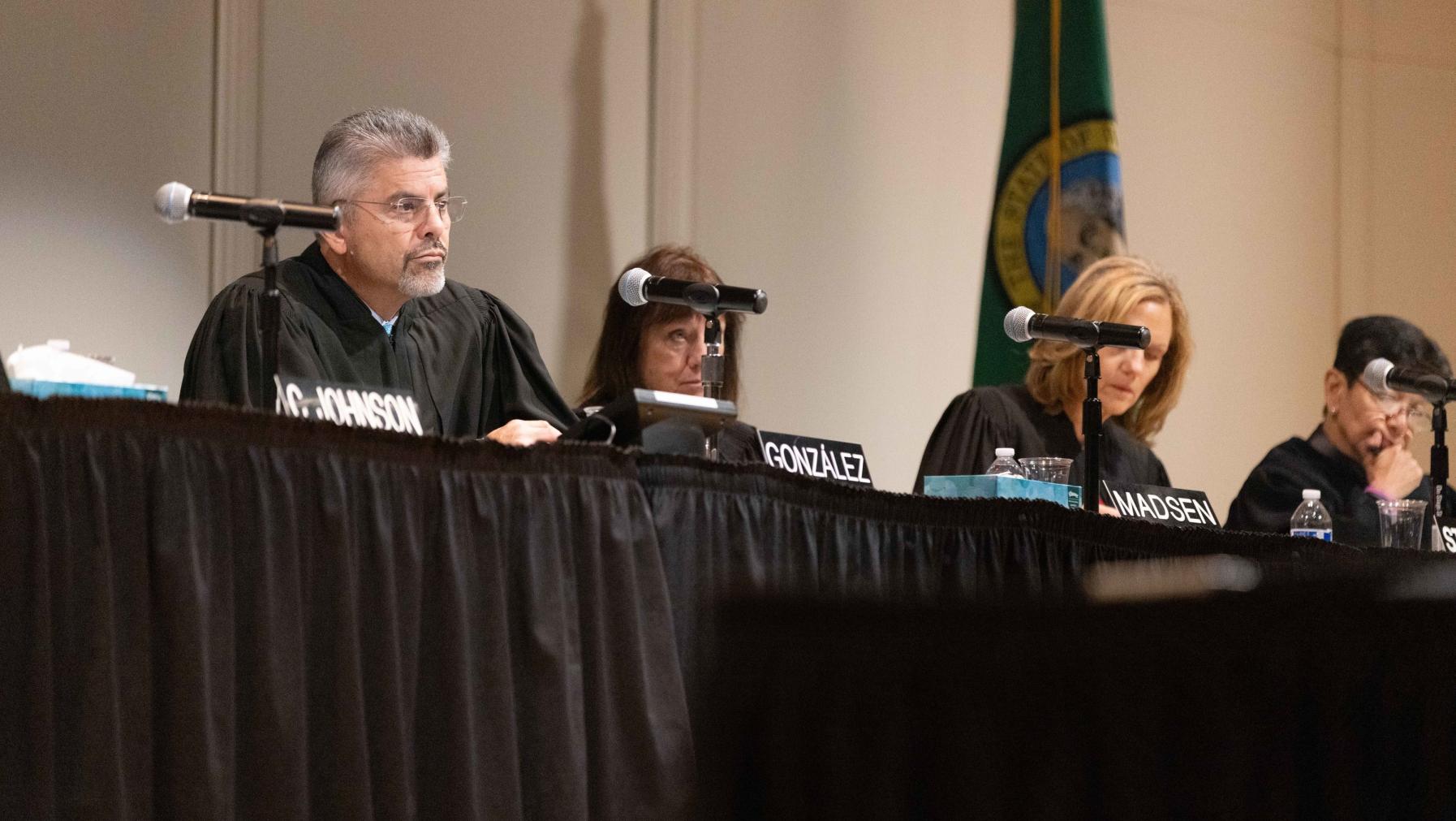 Washington State Supreme Court hears arguments in Schneebeck Concert Hall in 2023.