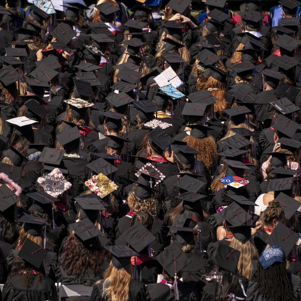 Aerial view of students wearing mortar boards at Commencement