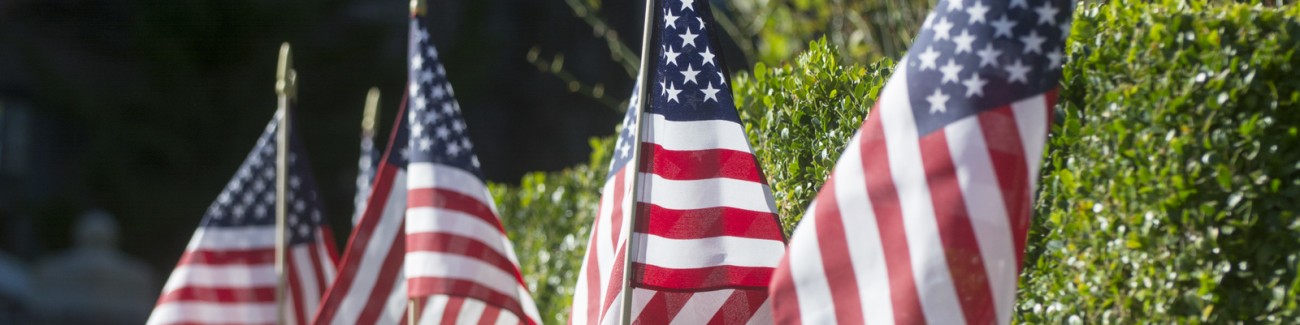 Close up of a row of American flags