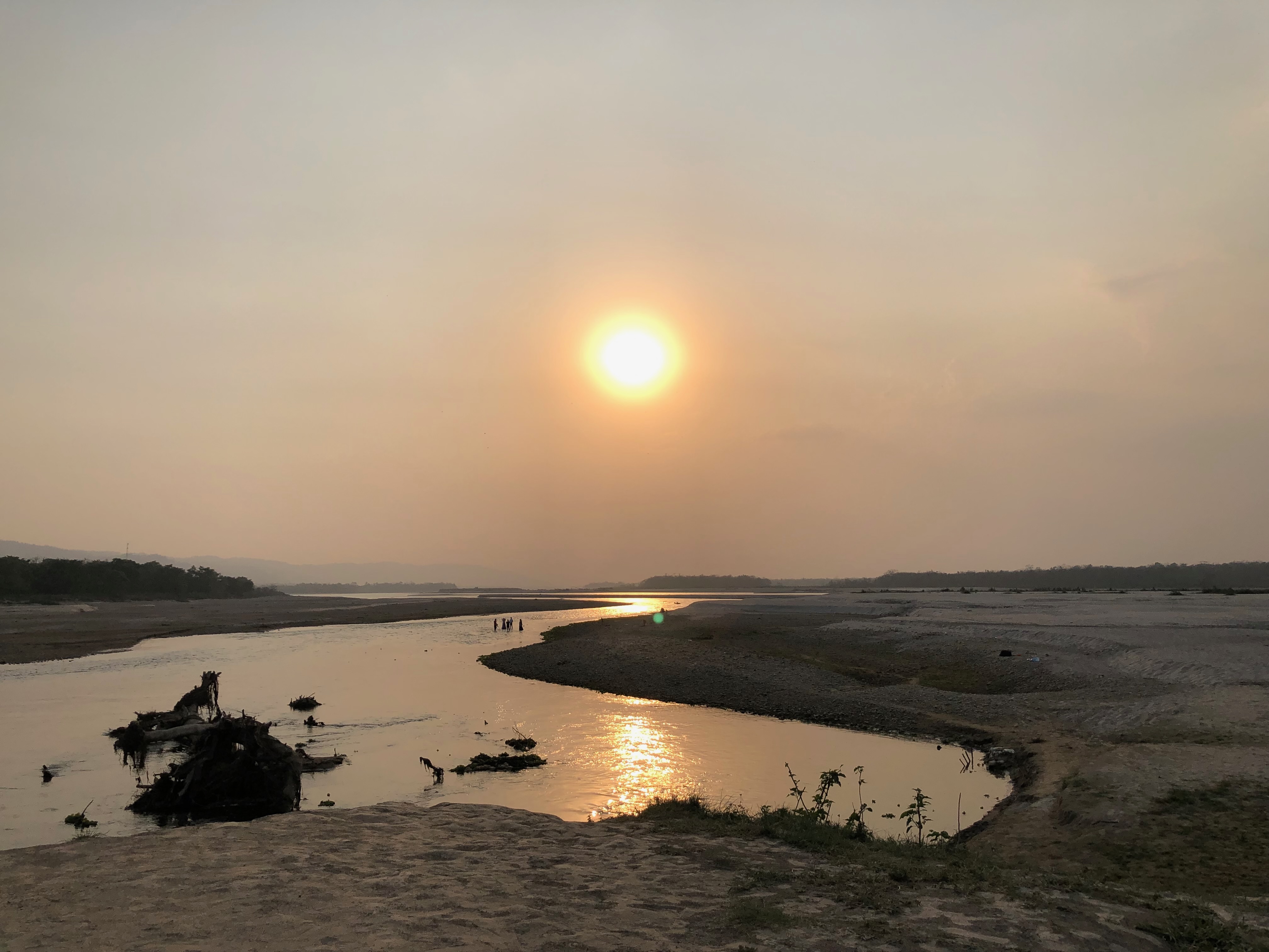 View along the East Rapti River, which is the border between Chitwan National Park and the Meghauli village area where NTT works.