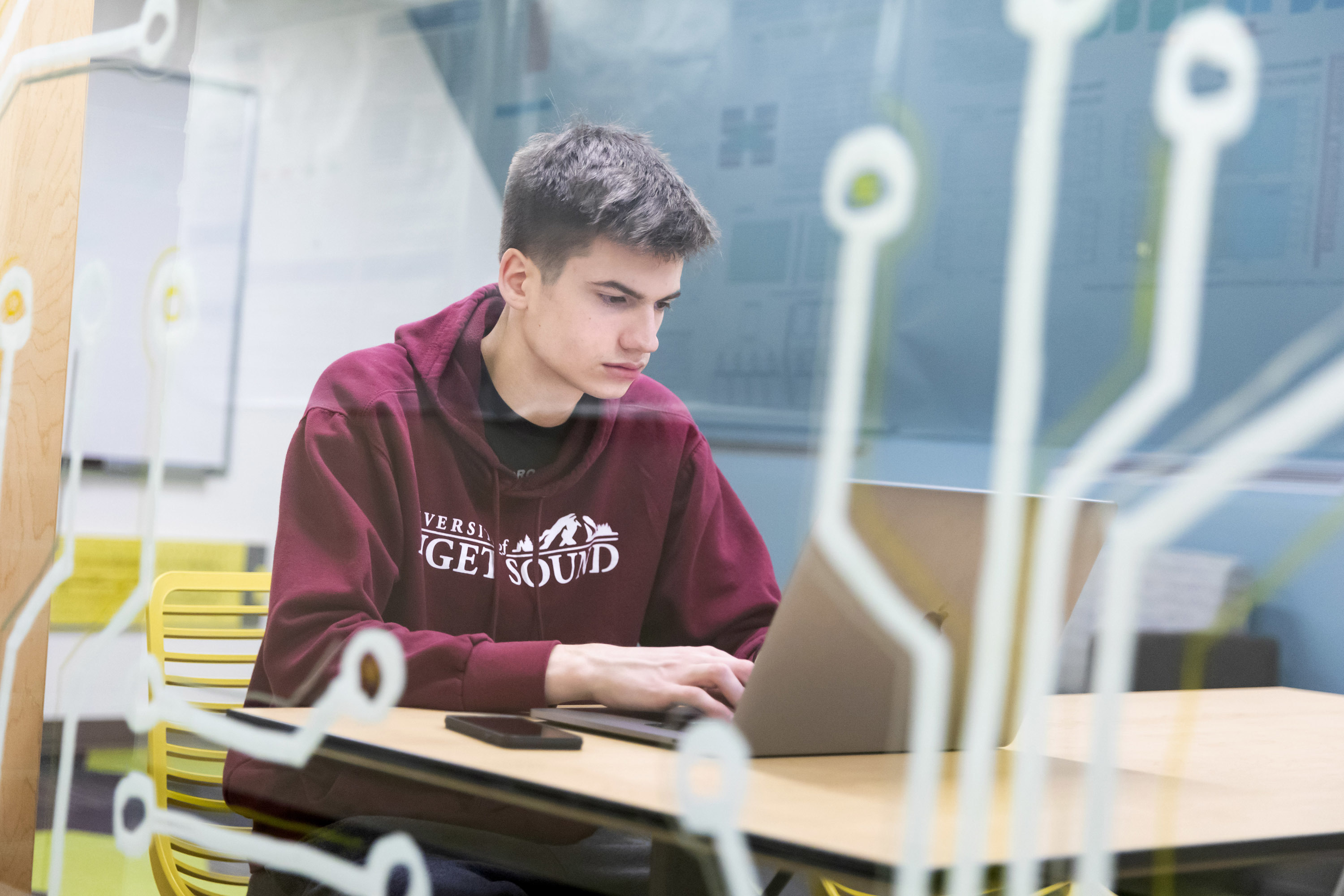 A student in the computer science lounge in Thompson Hall.