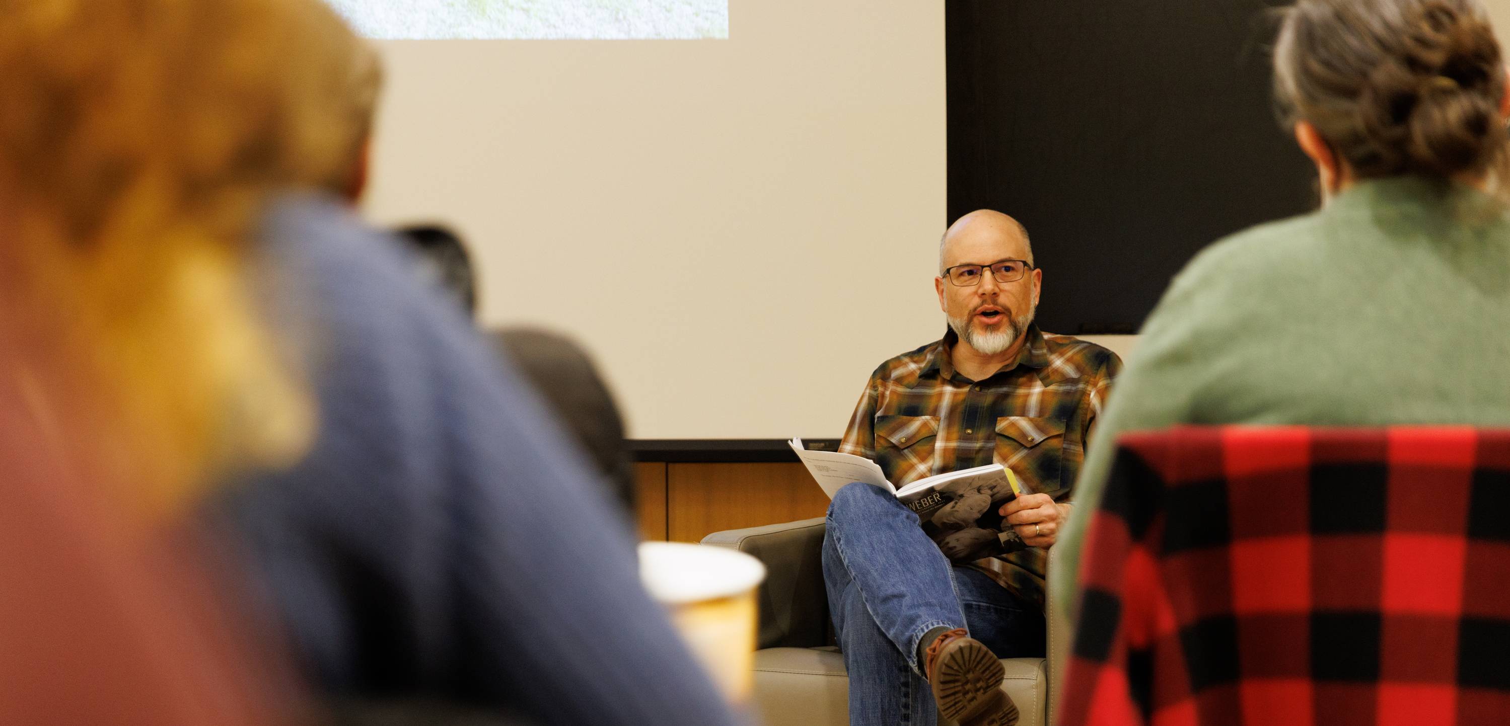 A professor during class discussion.