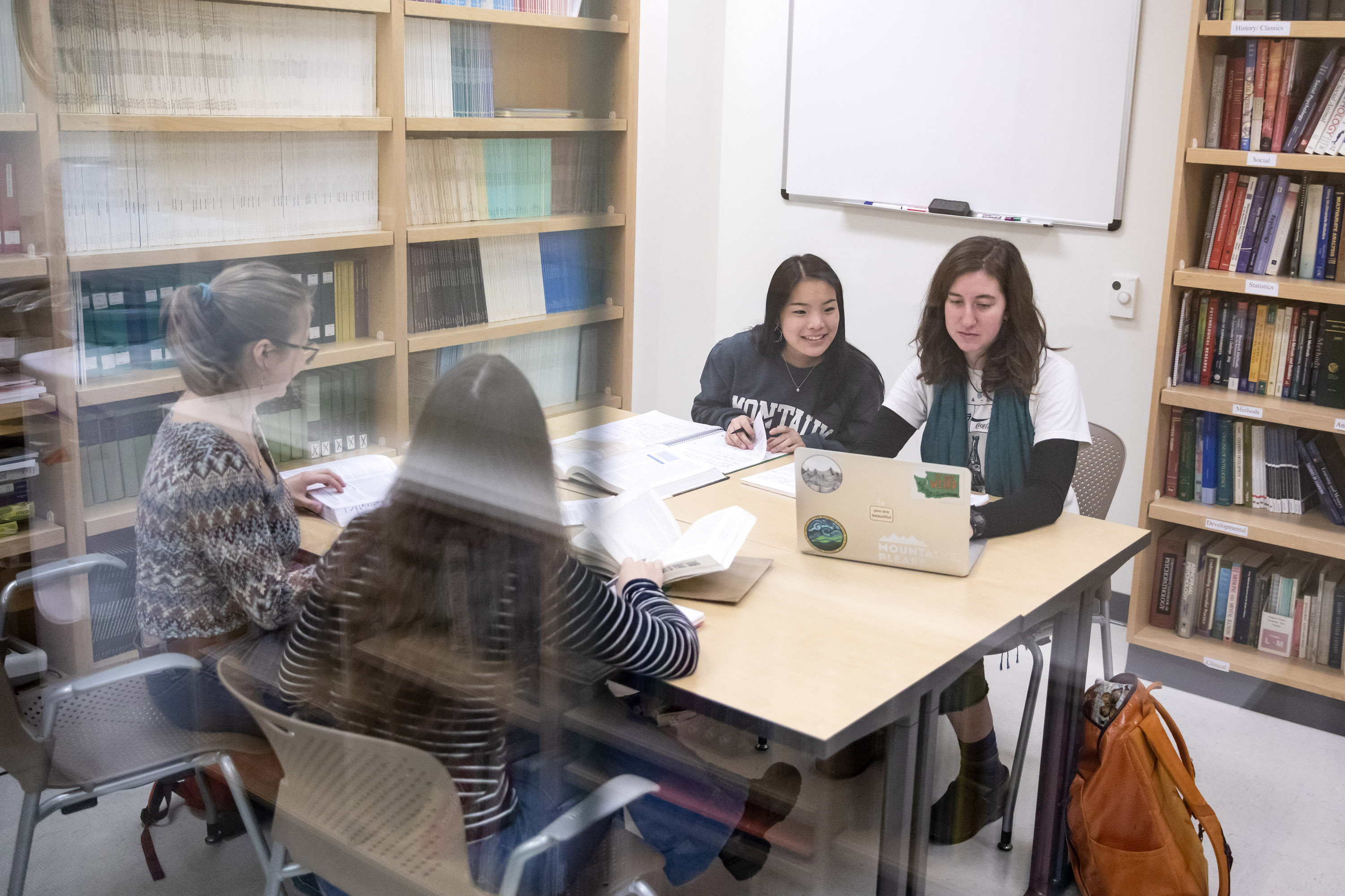 Students work in a psychology study room.