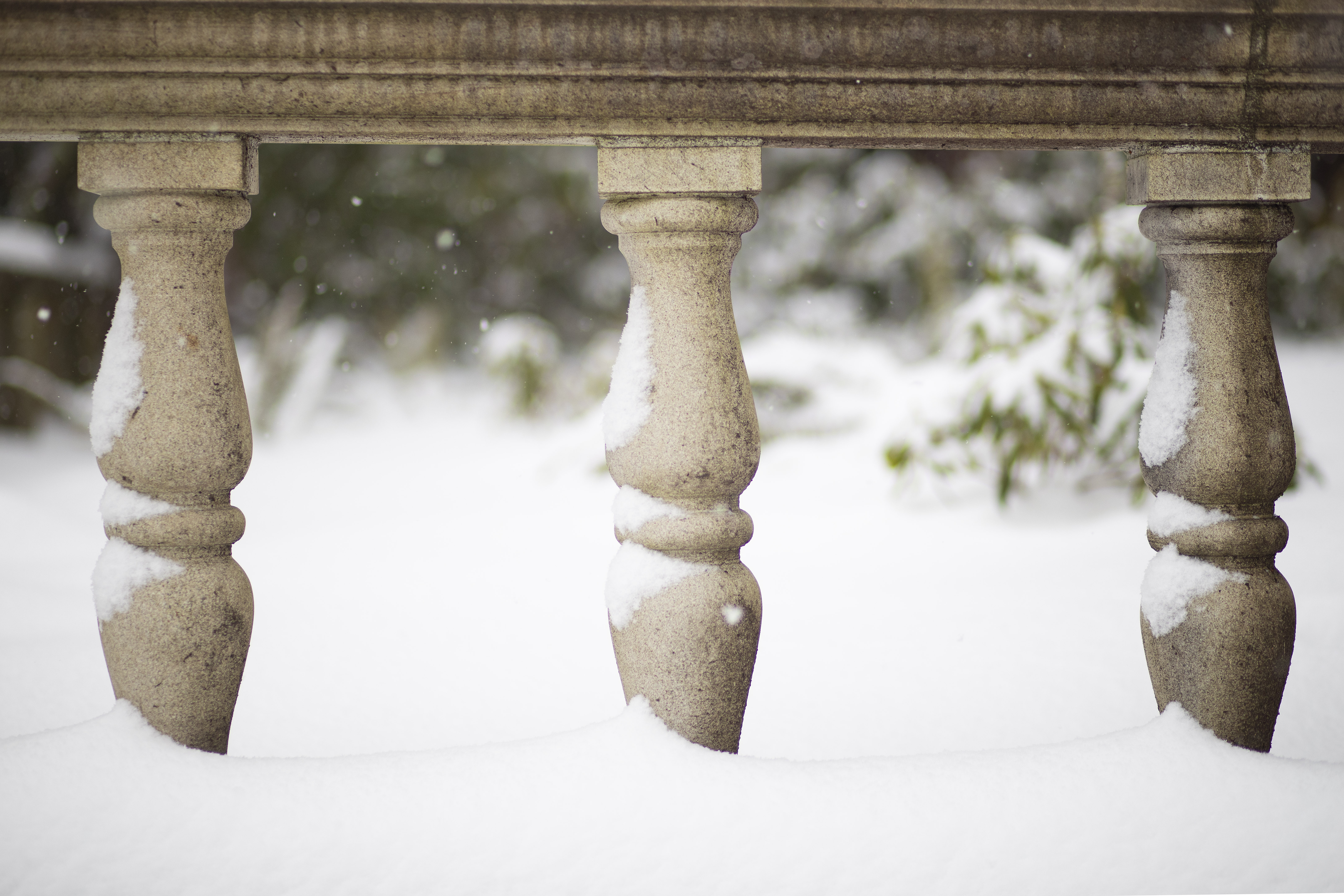 cement columns covered in snow