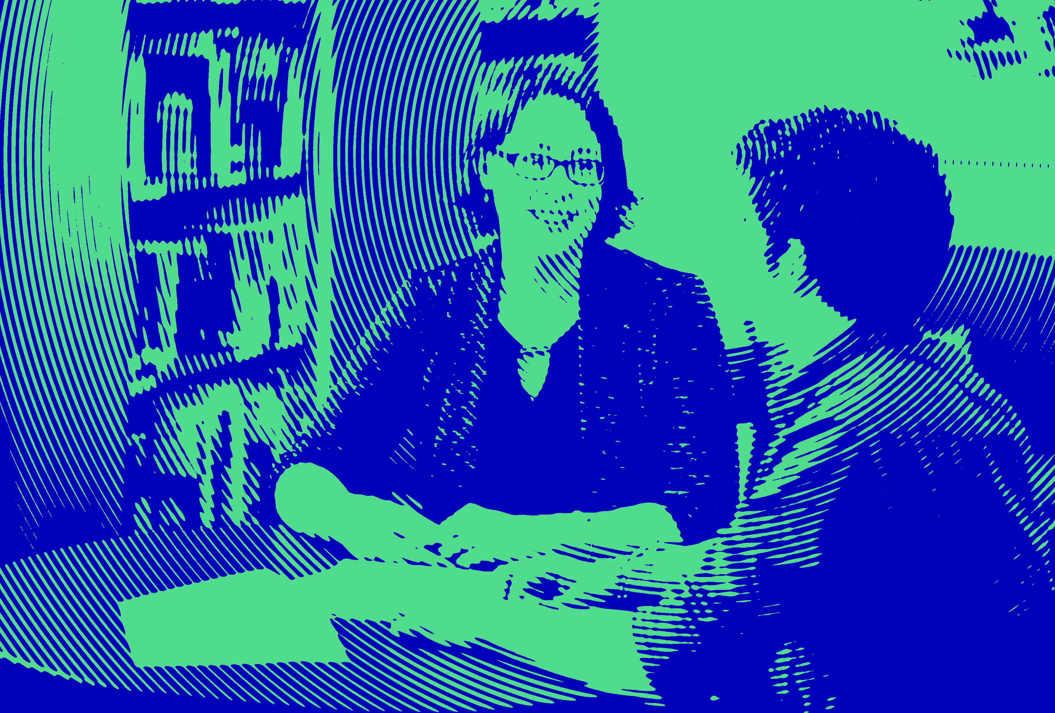 Student working with a staff member in Career & Employment Services (blue and green filter on image)