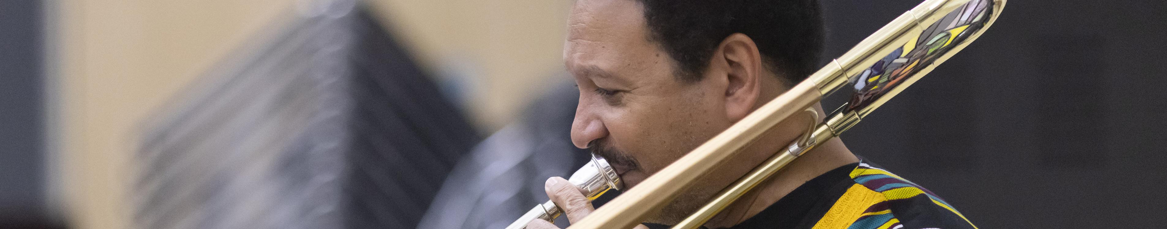 Jazz legend Delfeayo Marsalis plays trombone during rehearsal with the Puget Sound Jazz Orchestra