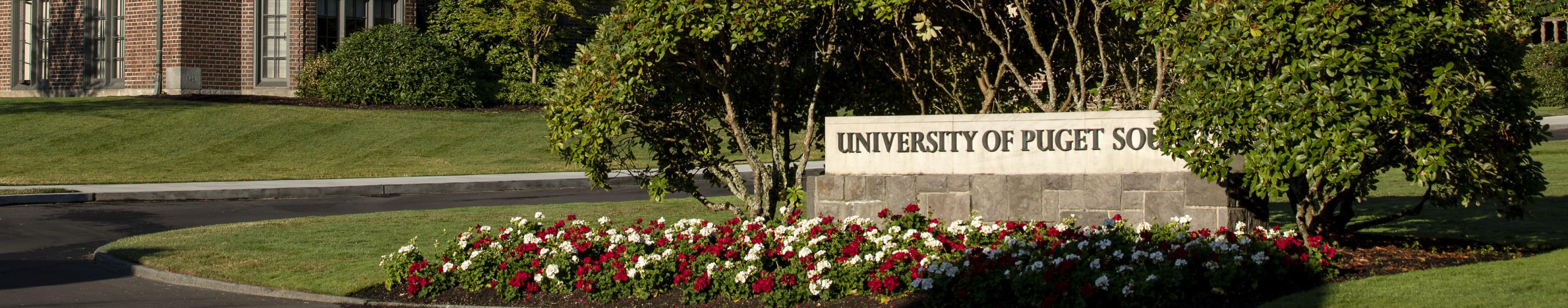 Howarth Hall and University of Puget Sound sign.