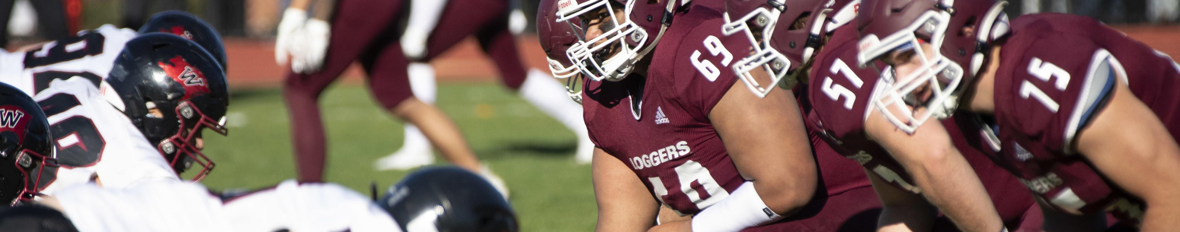 Caleb Puapuaga ’24 prepares for a play with the Logger Football team in 2021.