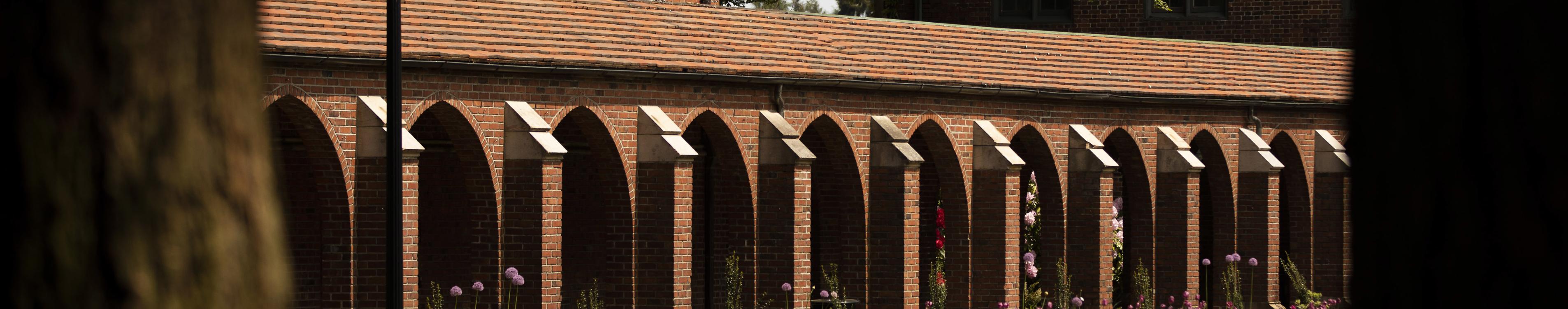 A row of red brick archways