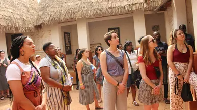 People looking at Traditional Ashanti homes in Kumasi