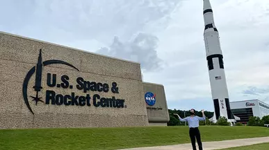 Kyra Lee ’24 in front of NASA's Marshall Space Flight Center