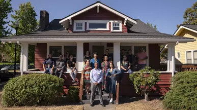 College Success Foundation group photo in front of its campus house