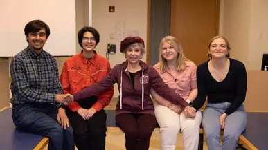 Rita Moreno with students.