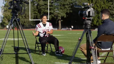 Lily Godwin ’26 being interviewed on KING 5.