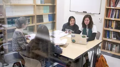 Students work in a psychology study room.