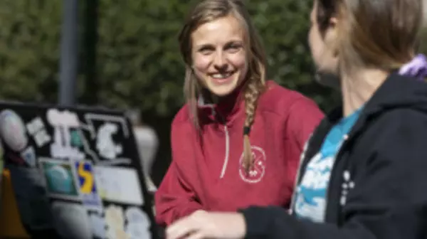 Two students with a laptop