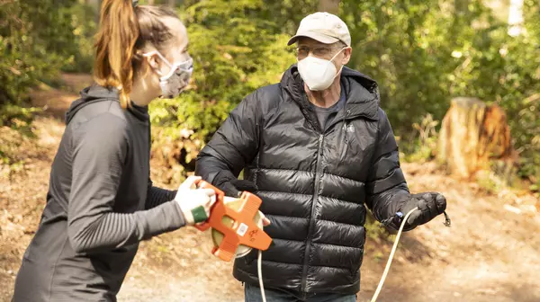 Joel Elliott with a student at Point Defiance Park