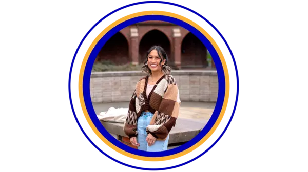 Circular photo of a student standing in front of Jones Hall Arches