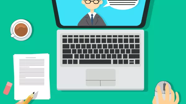 open laptop with person taking notes