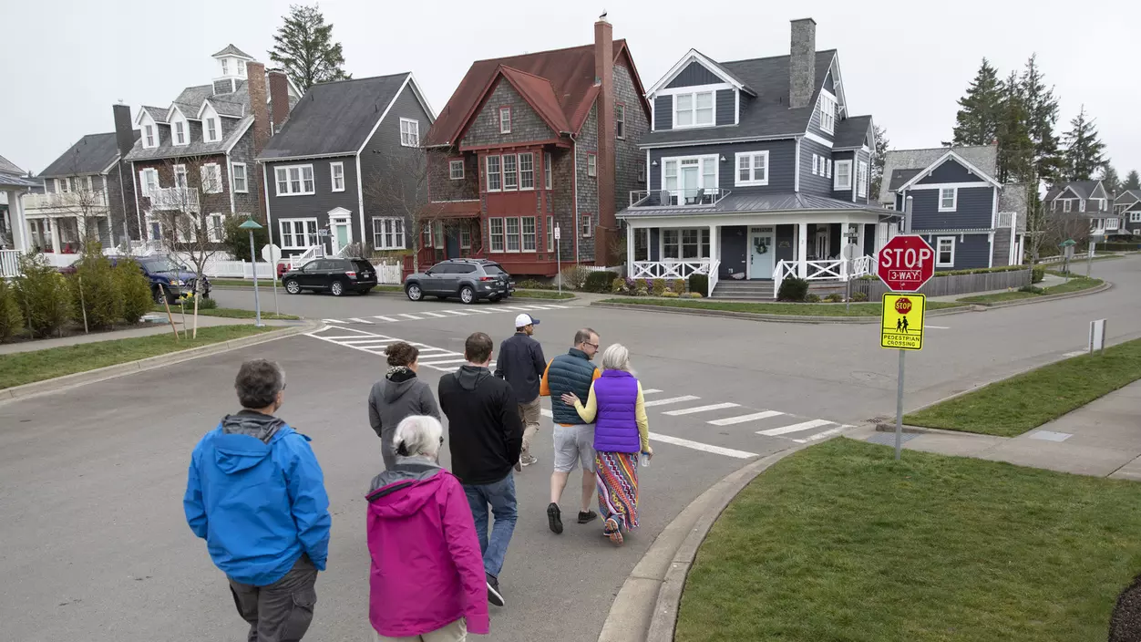 Group of people walking in a residential area