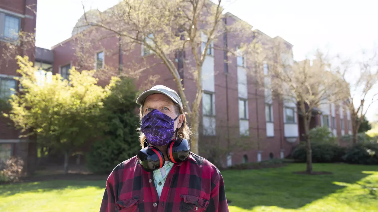 Andy Lambert outdoors on campus grounds