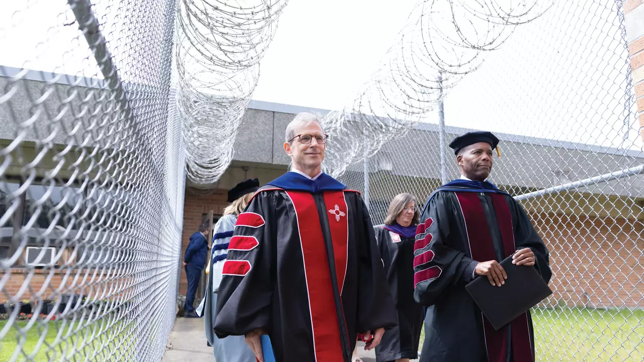 Provost Drew Kerkhoff (left) and President Isiaah Crawford led the university delegation at the first-ever FEPPS commencement in June 2024.