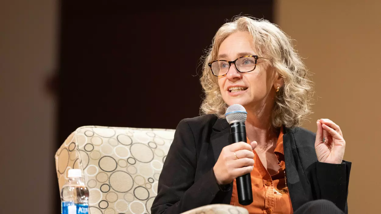 Prof. Robin Jacobson moderates a discussion on campus with members of the Washington State Supreme Court in 2023.