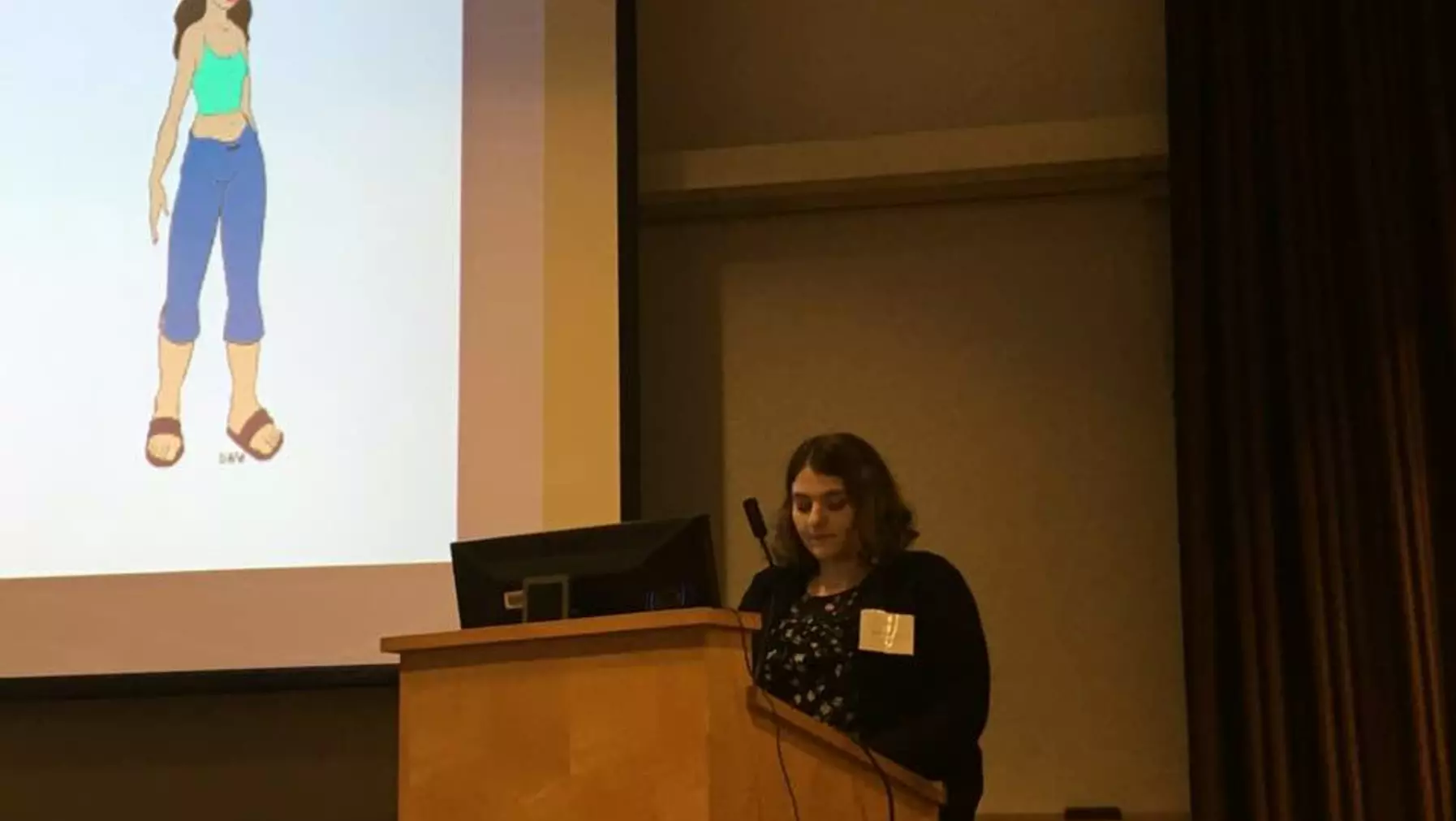 Madyson Frank '19 presenting at the 2019 Race, Rhetoric, Media Symposium