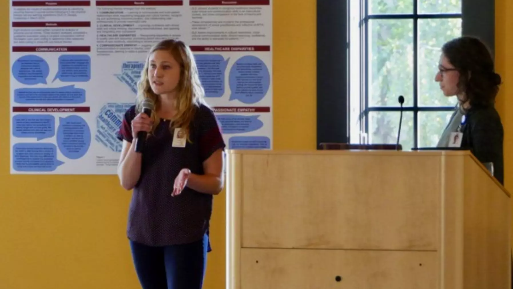 Kasey and Zoe presenting at the annual PT Research Symposium