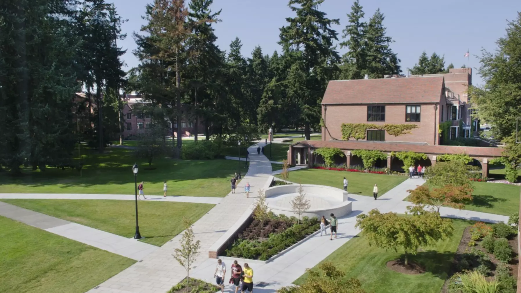 View over the Benefactor Plaza and campus on a vibrant sunny day