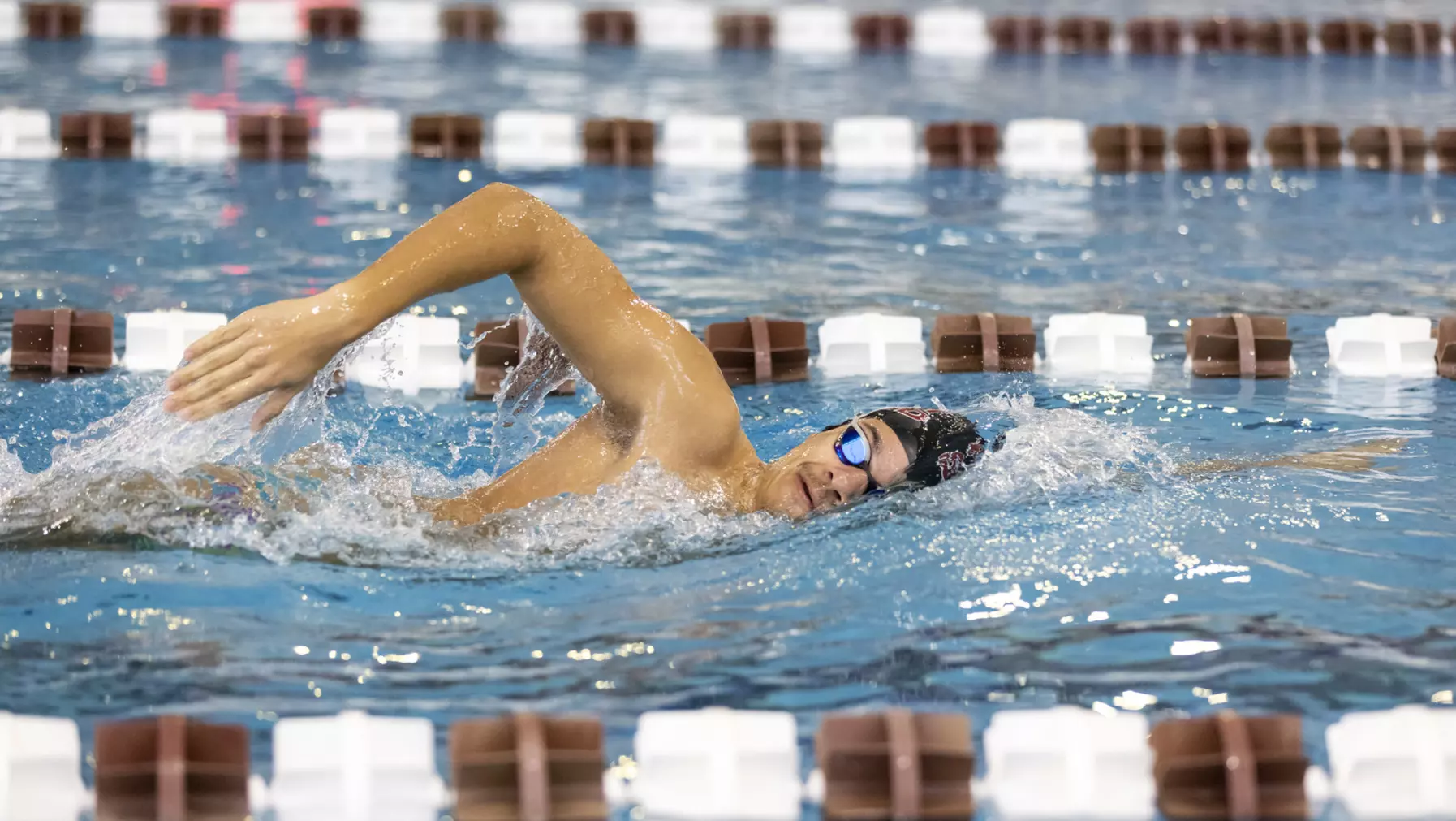 Jaden Francis ’25 does laps in Wallace Pool in the Athletics and Aquatics Center