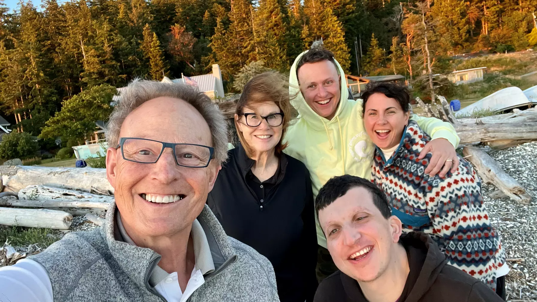 Members of the Leavitt family stand on a beach.