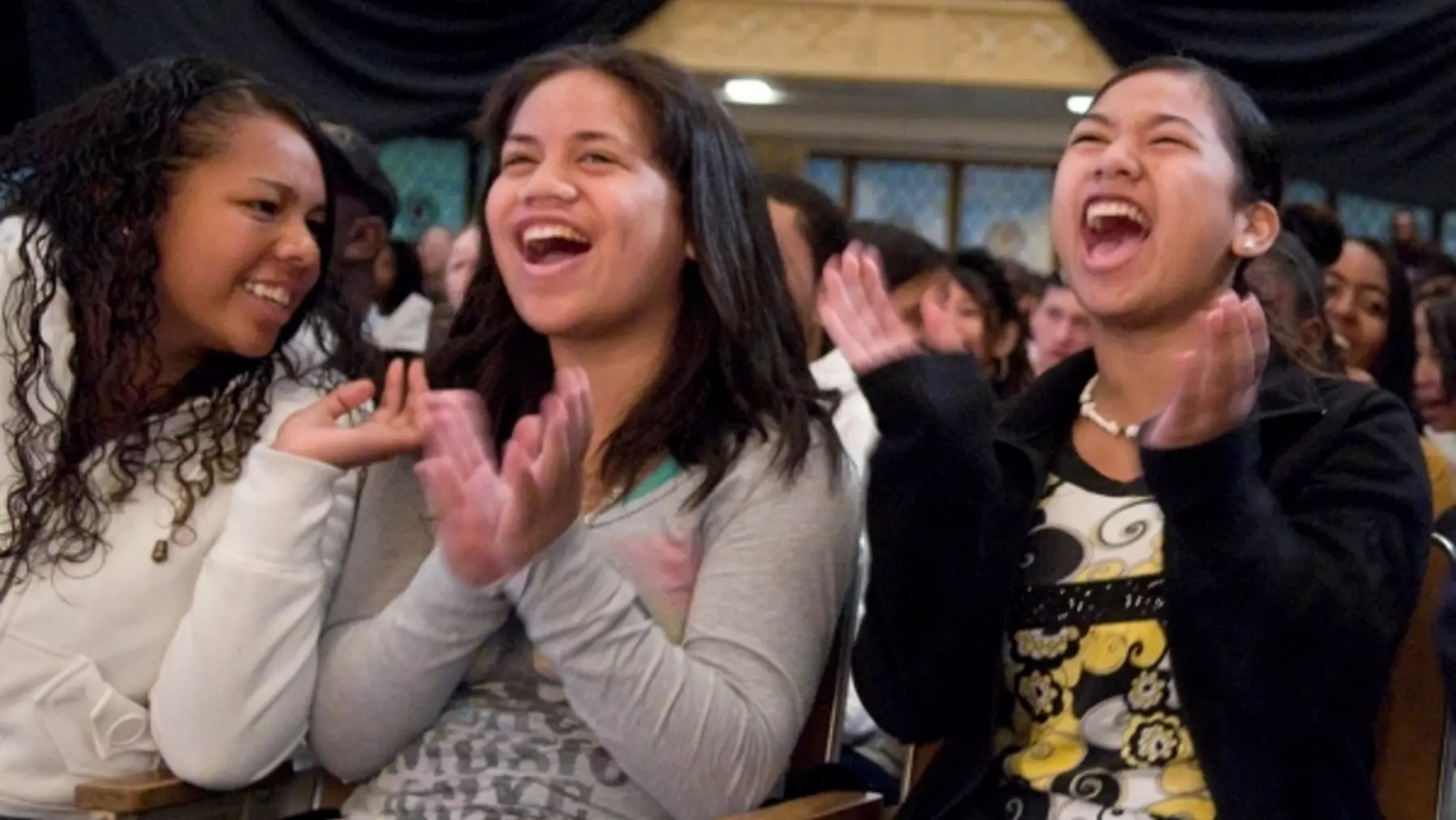 Students clapping