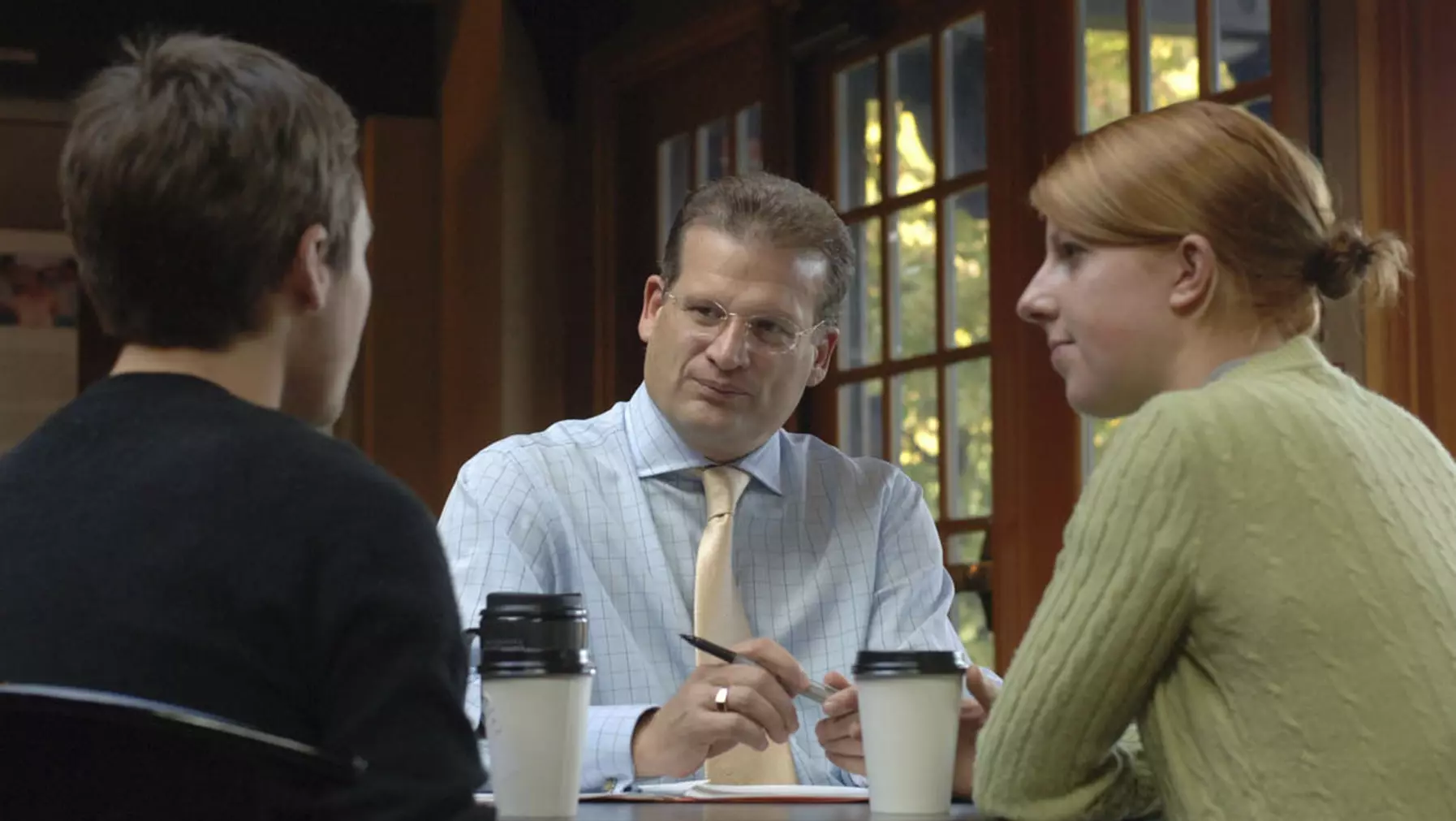 President Emeritus Ronald R. Thomas speaks with students.