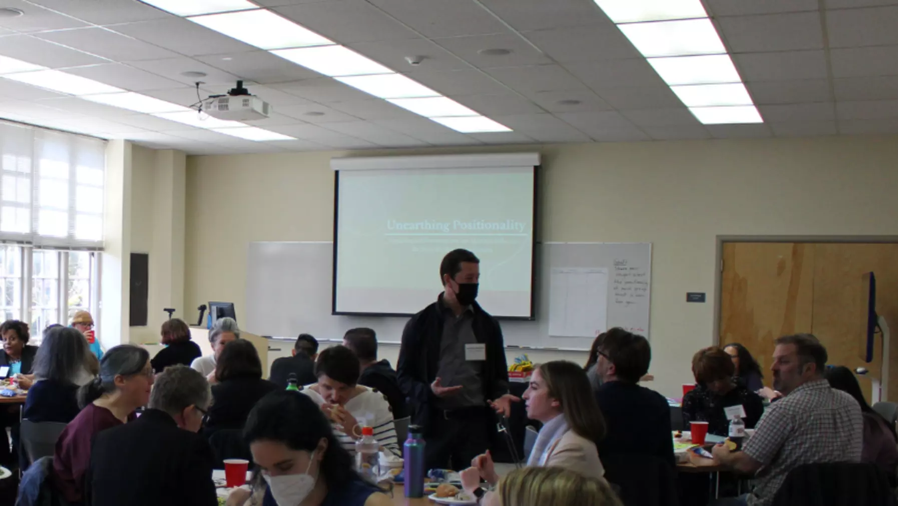 Jonathan Stockdale conversing with Faculty and Staff colleagues in attendance at the AFAM 399: Public Scholarship workshop titled Unearthing Positionality with RPI guest lecturer David Leonard in attendance. 