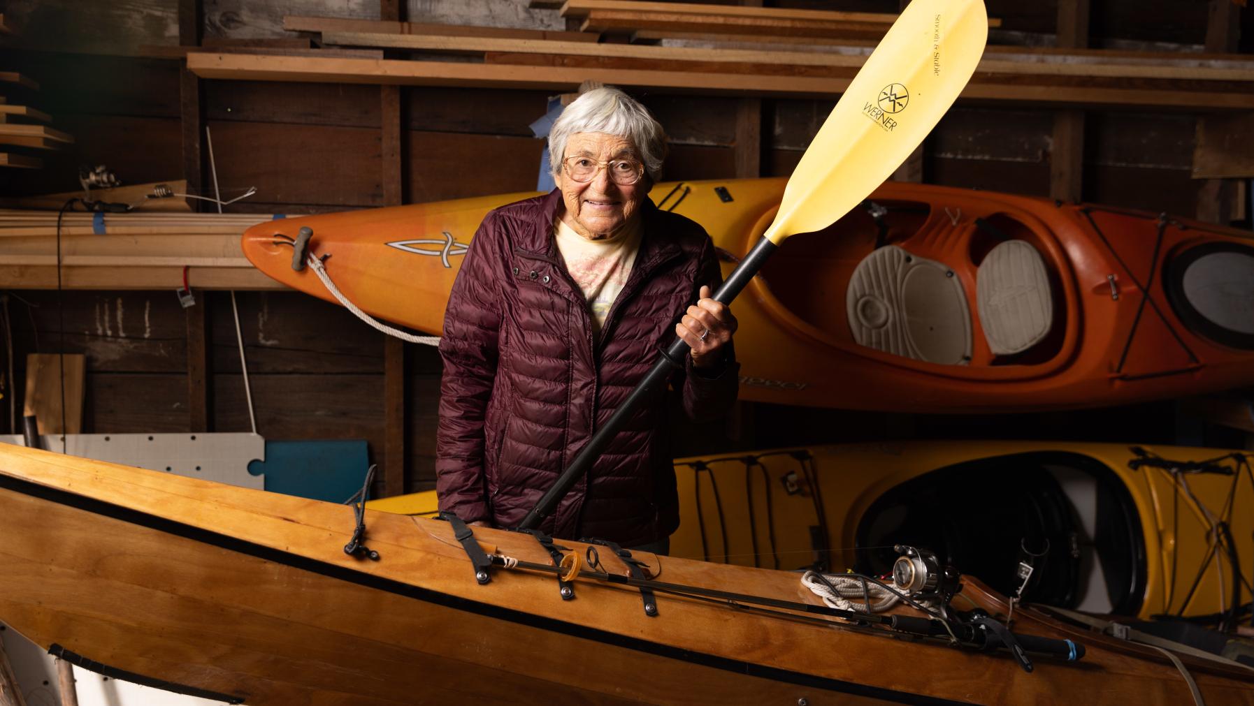 Carol Petrich Kalapus ’51 and her kayaks. Photo by Alex Crook.