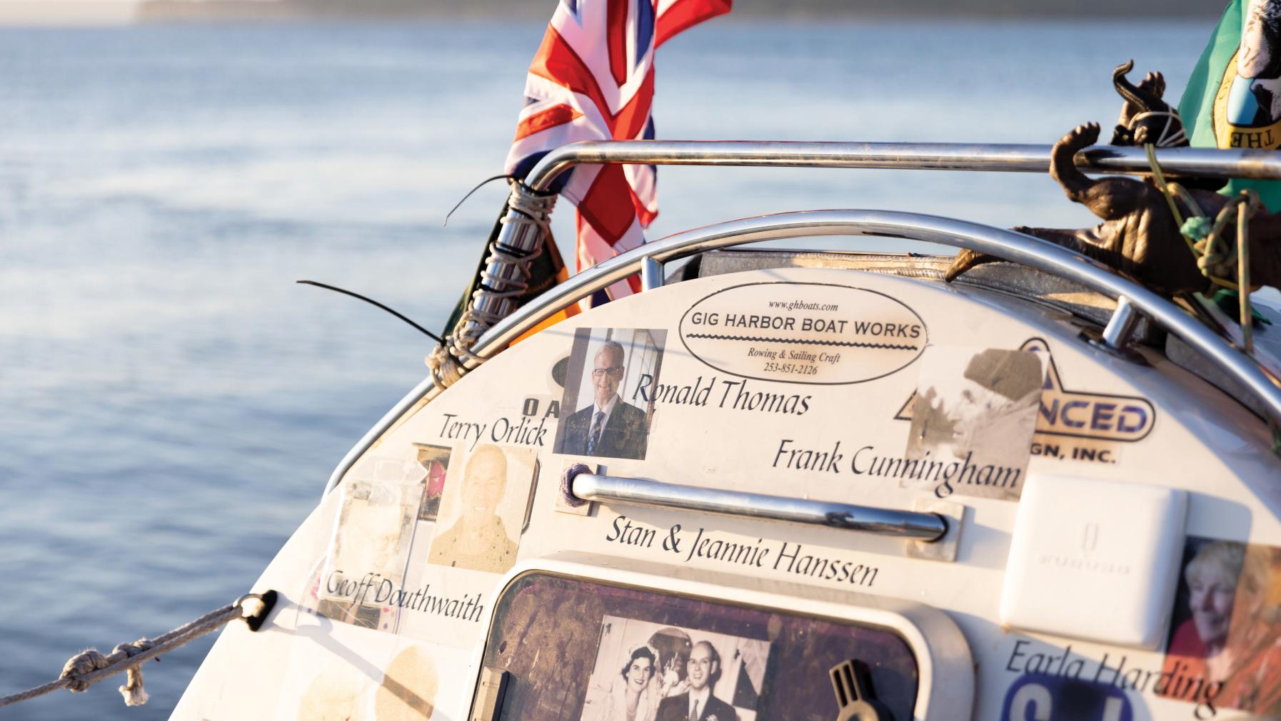 The rowboat was decorated with inspirational photos, including one of former Puget Sound President Ron Thomas. Photo by Alex Crook.