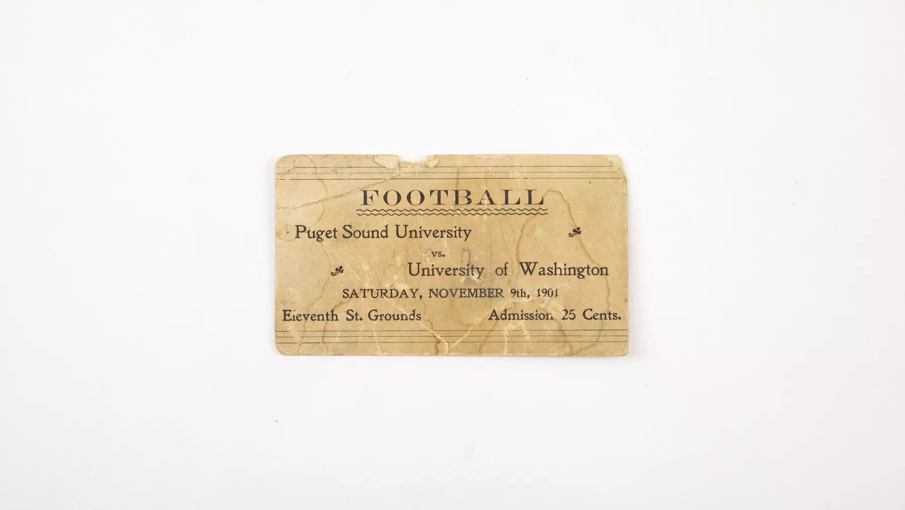 Paper ticket for a Puget Sound University football game in 1901 vs. University of Washington. Admission was 25 cents.