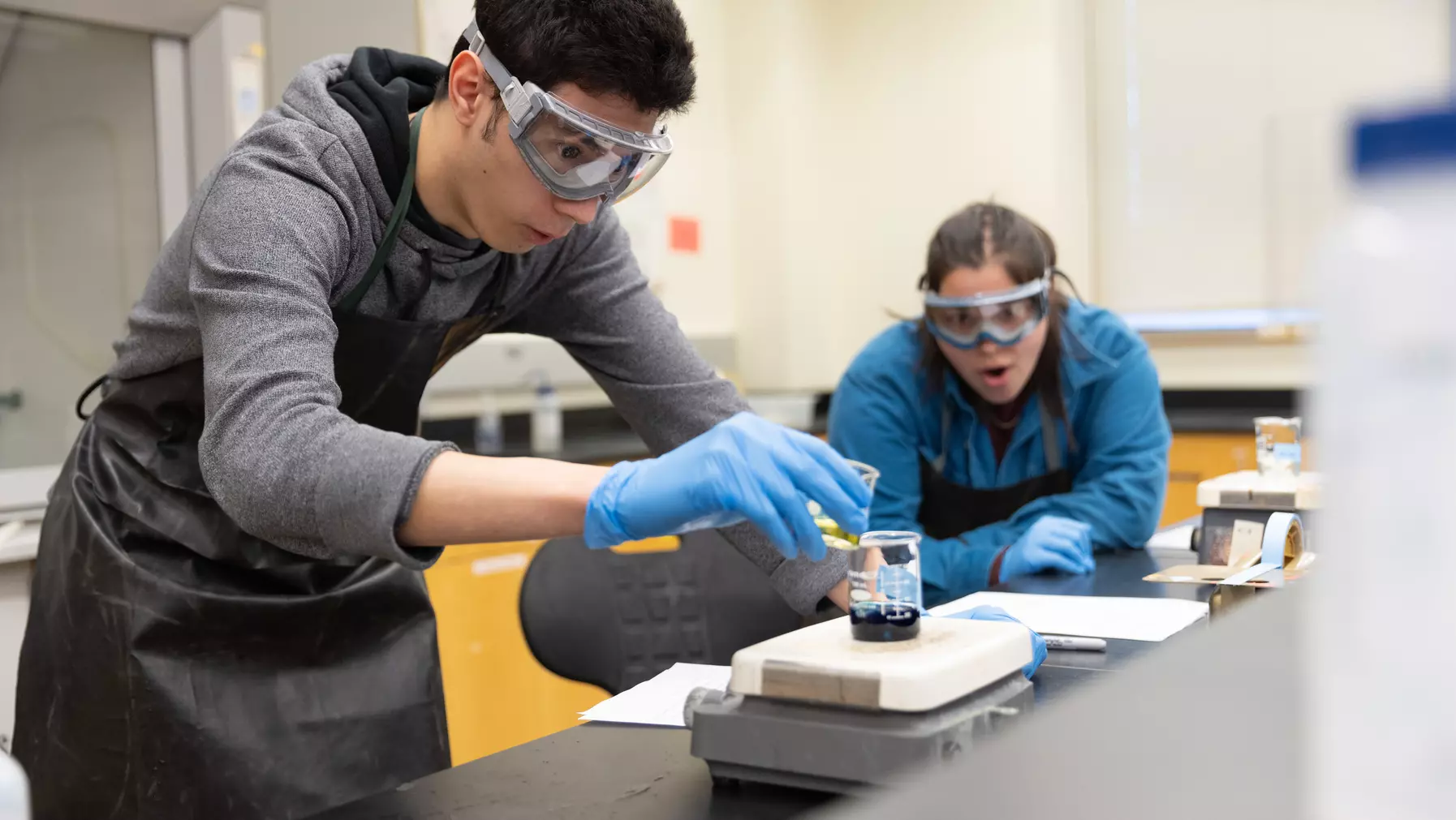 Students making Prussian blue in the lab.