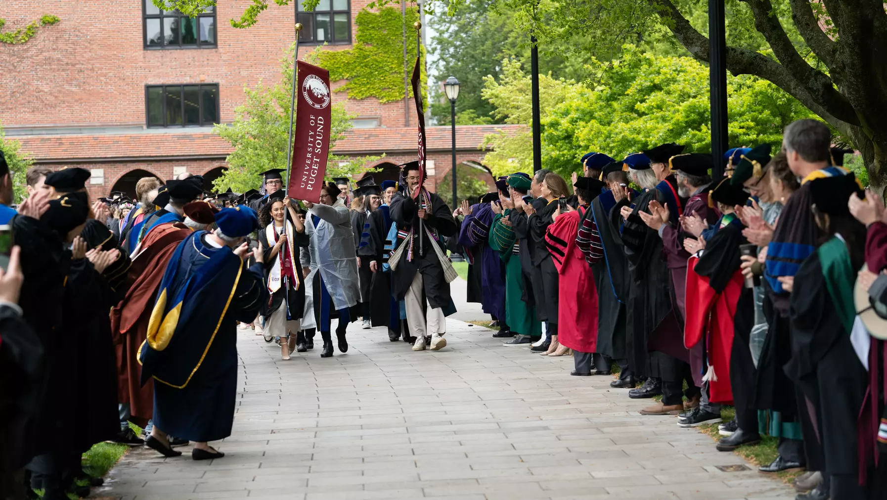 The walk to Baker Stadium for Commencement 2024