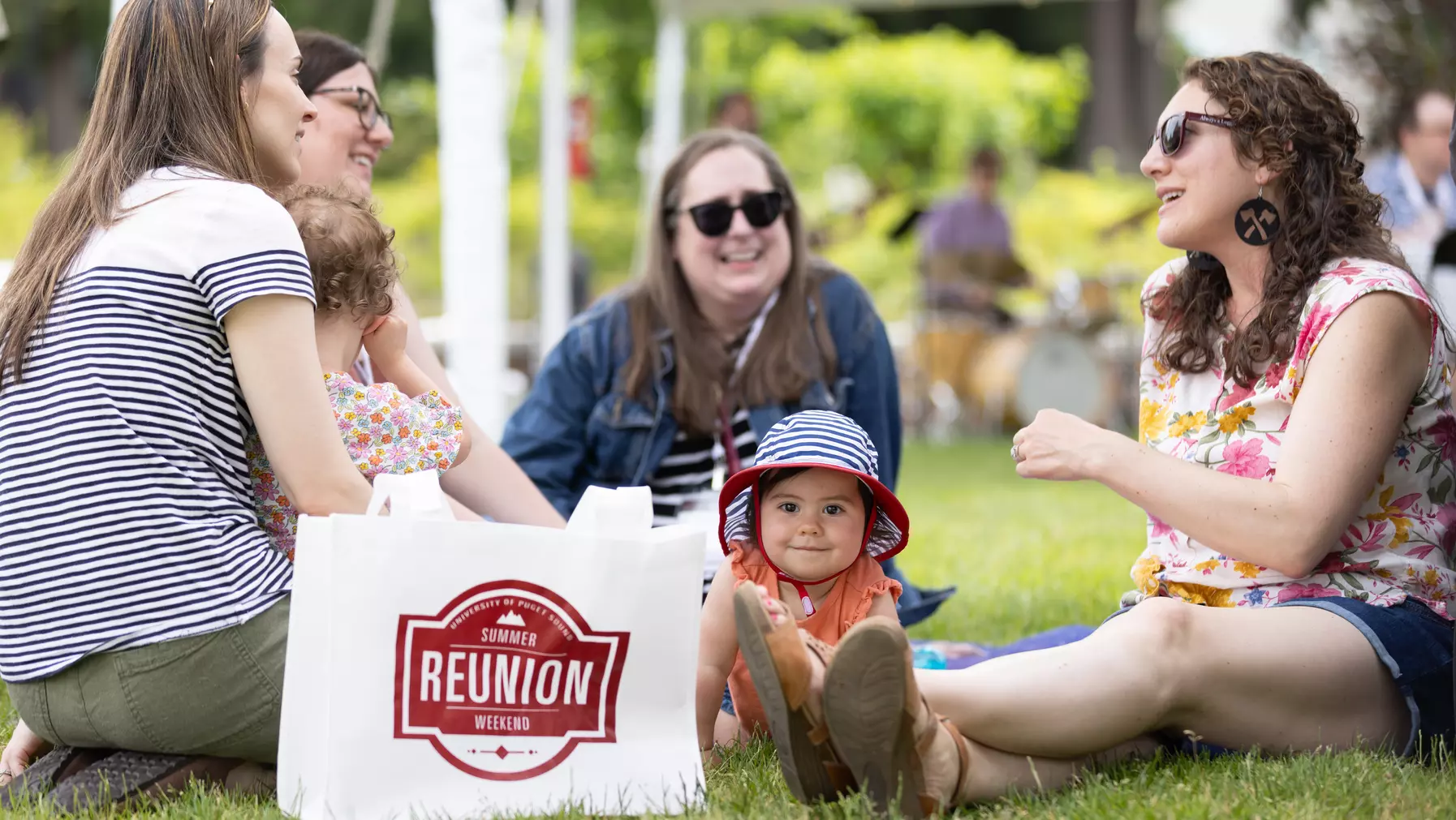 Alumni gather with their children during Summer Reunion Weekend 2024.