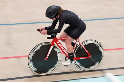 Clara Brown '17 riding a bike