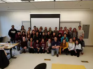 A large group of people posing for a photo