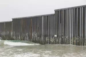 Border Wall with framed photograph attached