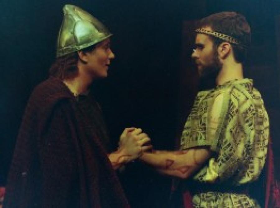 Two actors on a stage in a play